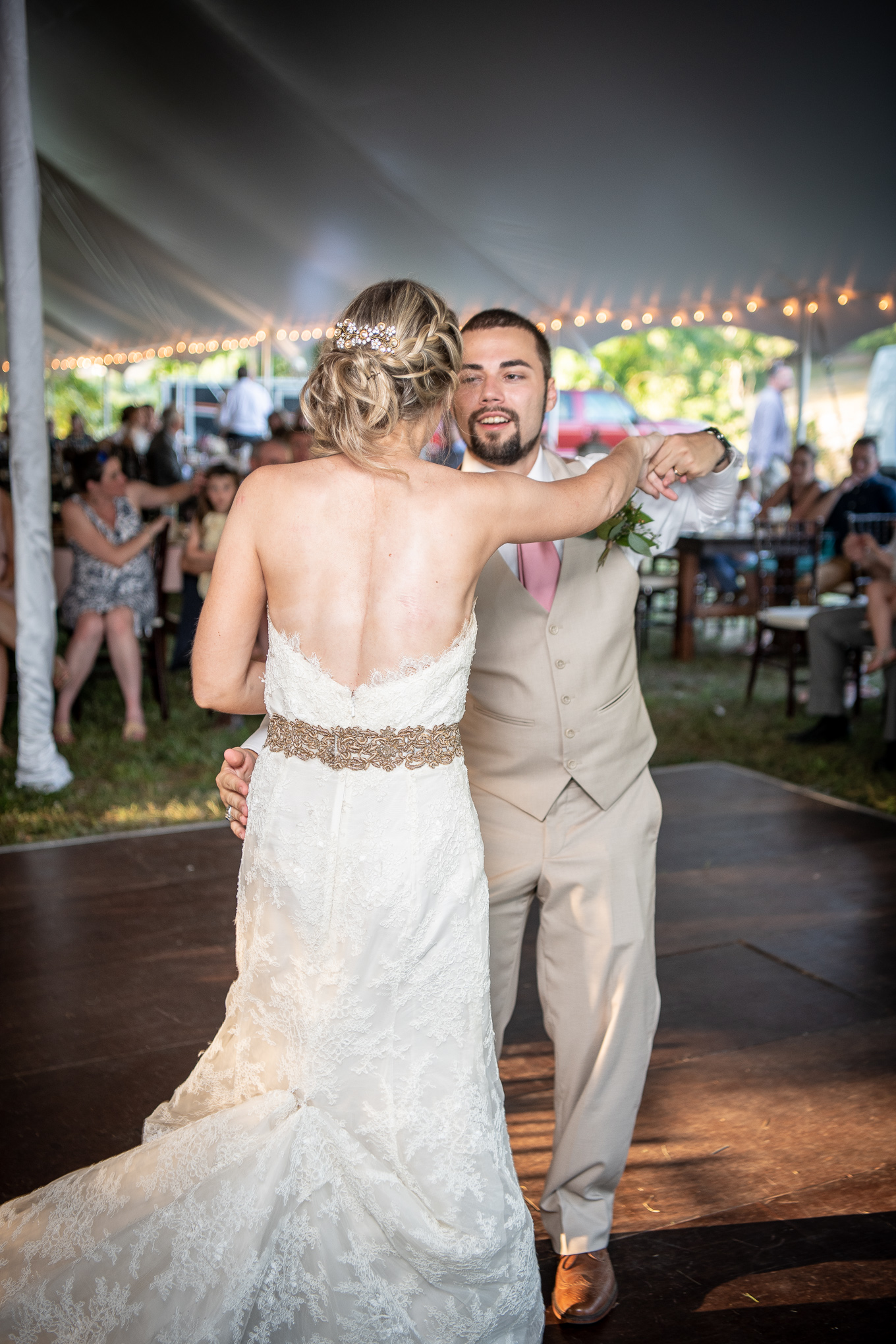 bride and groom dancing at their wedding reception 